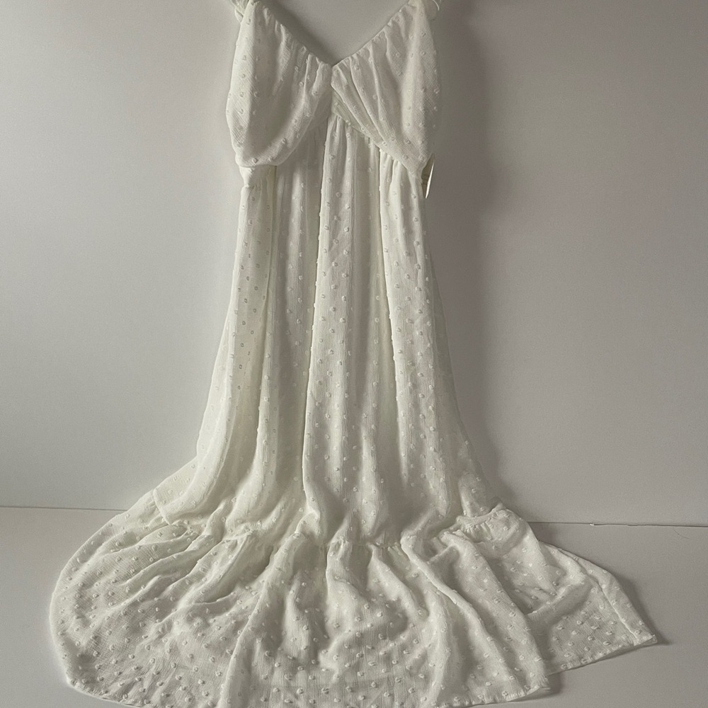 Altar'd State Women’s bohemian styled or running through the flowers type dress.